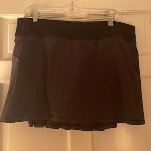 Black pleated Lululemon Tennis Skirt